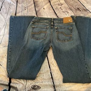 Tilt boot cut medium wash denim jeans